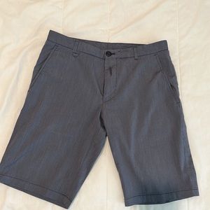 Hugo Boss flat front 9 1/2 inch length dress shorts from the RED collection.